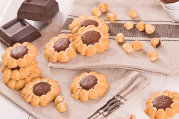 Flower shaped chocolate biscuits.
