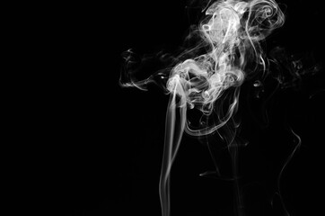 abstract fragment movement of white smoke on black background.