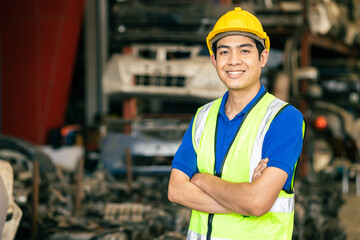 confident Asian male engineer worker standing arm crossed happy smile for enjoy working in factory - Powered by Adobe