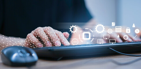 close up on robot hand working on laptop to checking correct data by using RPA function software...