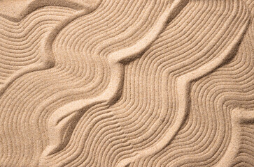 Abstract background of sand. Abstract sand waves as a background. Copy space. Macro. 