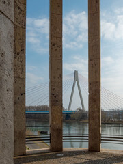 View through stone pillars to the bridge across the river Rhine near to Neuwied
