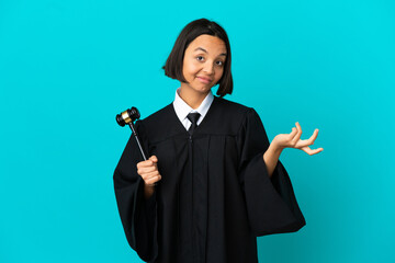 Judge over isolated blue background having doubts