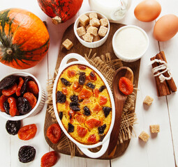 Pumpkin casserole with dried fruits - 425335394