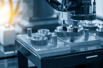 The hi-technology  material handling process by robotic system with mechanical gear parts. The...