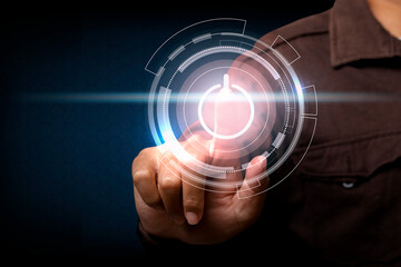 man touching screen, pushing on a touch screen power button.