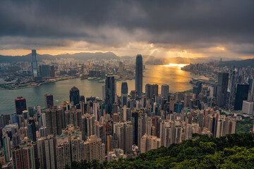 Dramatic sunrise of Hong Kong city skyline from Victoria peak, China - obrazy, fototapety, plakaty