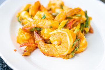 Stir fried shrimp with salt eggs sauce.