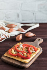 Traditional Spanish pizza coca on a light background