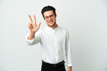 Naklejka premium Russian Business man isolated on white background happy and counting three with fingers