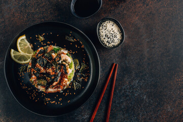Spicy shrimp sushi stacks with layers of sushi rice, cucumbers and avocado spicy shrimp and furikake