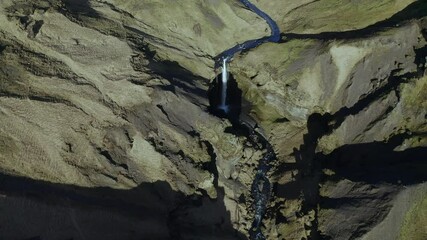 Majestic Scenery At Kvernufoss, Tall Hidden Waterfall Near Skogafoss In Southern Iceland. aerial drone pullback
