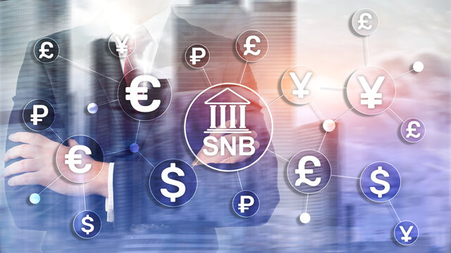 Different currencies on a virtual screen. SNB. Swiss National Bank