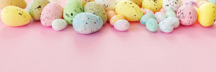 Beautiful Easter card with colorful eggs on paper pink background.