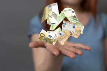 bill euro banknote in hand rain