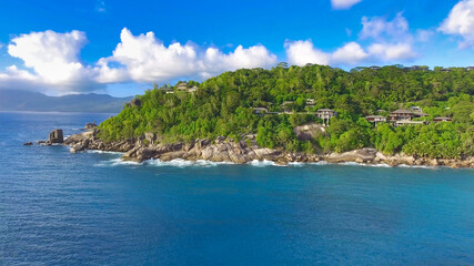 Fototapeta premium Anse La Liberte' in Mahe', Seychelles. Amazing aerial view from drone