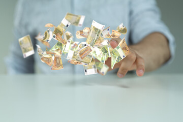 bill euro banknote in hand rain