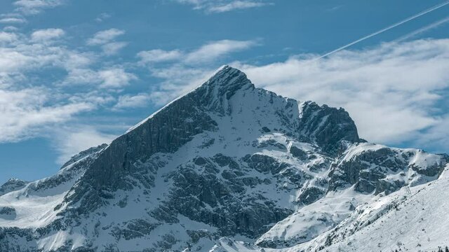 beautiful winter landscape tiemlapse and skiing resort at kreuzeck garmisch, with view to alpspitze mountain, upper bavaria. Kreuzeck, Bavaria, Germany  4k Timelapse