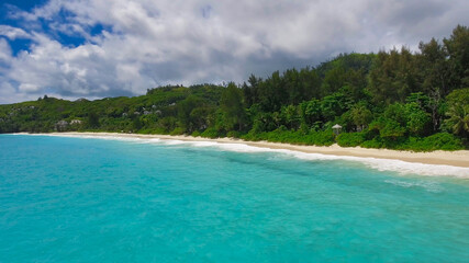 Fototapeta na wymiar Drone viewpoint of beautiful Seychelles coastline on a sunny day