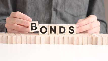 the word of bonds on building blocks concept