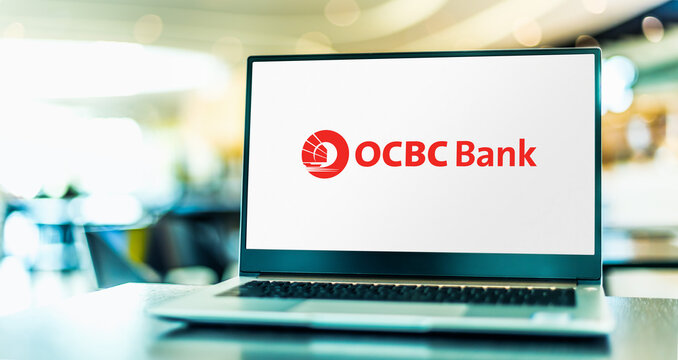 Laptop computer displaying logo of OCBC Bank