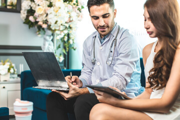 doctor doing a dermoscopy dermoscopy prevention on a female patient in his office.Young sick woman showing her arm to doctor while visiting clinics