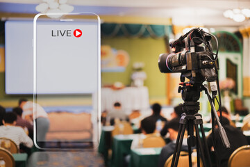 Video camera taking live video streaming with lighting frame of mobile phone and Live text at...