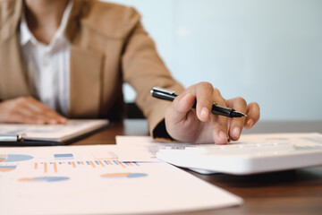 Businessman Accountant investment risk analysis. saving money for Stock market trading with calculator. Accountancy Concept.