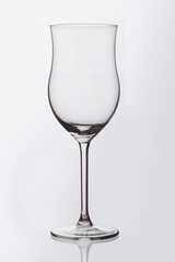 large transparent wine glass on a white background