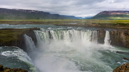 view of the majestic Godafoss waterfall near the city of Akureyri during summer season 