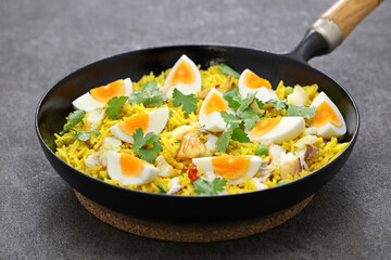 Kedgeree; spice rice with smoked haddock nad boiled eggs, homemade english breakfast