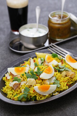 Kedgeree; spice rice with smoked haddock nad boiled eggs, homemade english breakfast