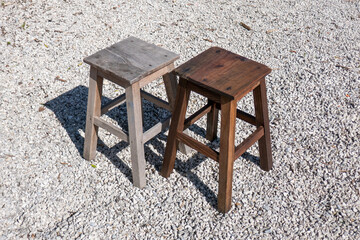 Comparison between two wooden stools. One old and ruined, the other treated and impregnated with...