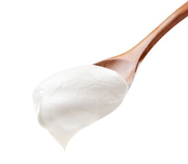 Sour cream in a wooden spoon on a white background. Isolated