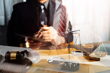 Business and lawyers discussing contract papers with brass scale on desk in office. Law, legal services, advice, justice and law concept picture with film grain effect