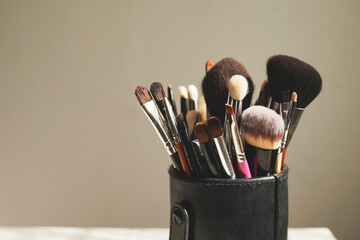 Professional visage brushes for face makeup on table. beauty salon