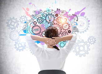 Young attractive woman is holding hands behind her head