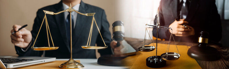 justice and law concept.Male judge in a courtroom on wooden table and Counselor or Male lawyer...