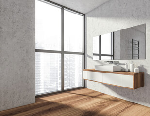 Bathroom interior with sink and mirror on grey wall near window