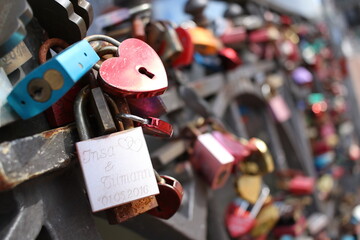 Rusty love locks on a bridge in the Hafencity, Hamburg