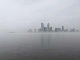Fog over Jersey City & the Hudson river from Downtown New York - March 2021