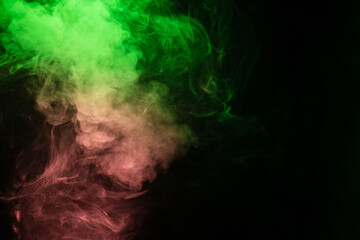 Green and pink steam on a black background.