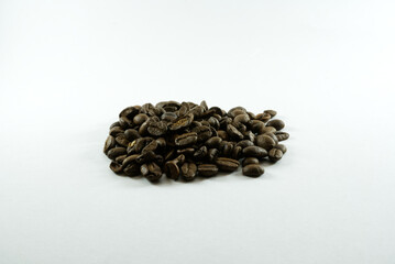 coffee beans on white background with selected focus