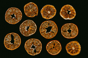 Fototapeta na wymiar Citrus, oranges and orange slices on a colored background with a place under the text
