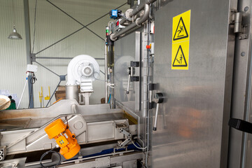 Entrance to the chamber for instant freezing of berries, fruits and vegetables.