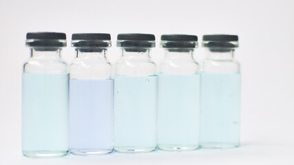 Medical ampoules for injection isolated on white background. Medicines and disease treatment, pharmacology and science concepts.