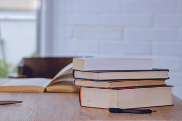 books stacked on the desk