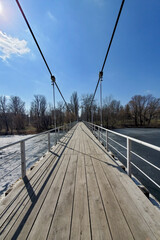 wooden bridge over the river