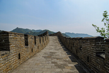 Fototapeta premium Standing on the Great Wall of China, Mutianyu Section