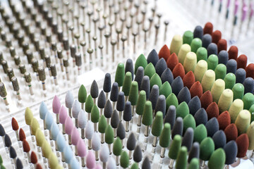 Abrasive attachments for the grinder. Equipment for cosmetic procedures of various shapes and sizes. Lots of amenities. Selective focus